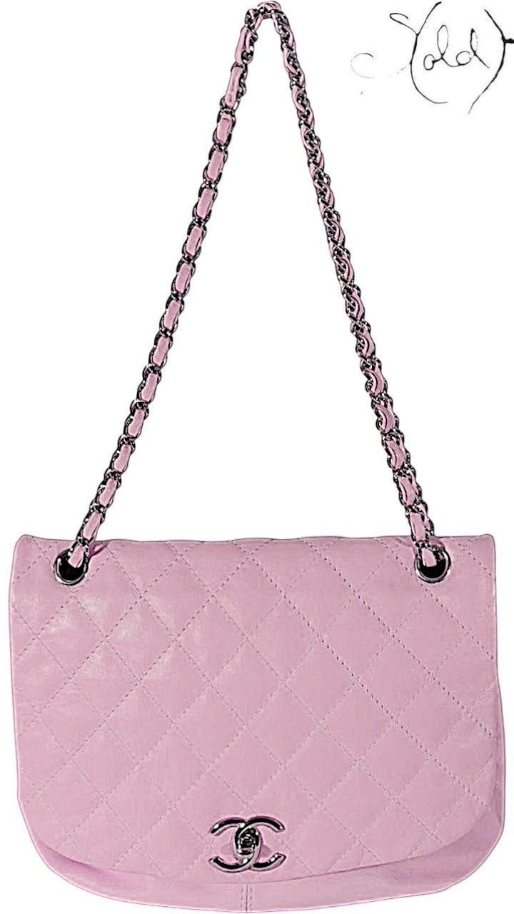 Sold Attire pastel purple lambskin Chanel Trianon messenger bag with diamond quilting and brushed gold-tone CC turn-lock closure.