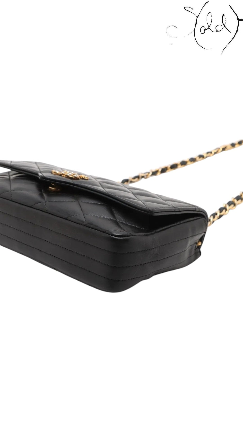 Sold Attire vintage Chanel black quilted lambskin single flap bag with crystal CC turn-lock and gold chain strap