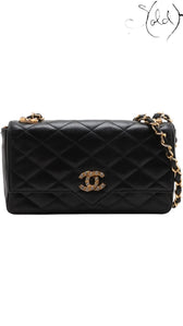 Sold Attire vintage Chanel black quilted lambskin single flap bag with crystal CC turn-lock and gold chain strap