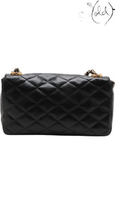Sold Attire vintage Chanel single flap bag in black quilted lambskin leather with gold-tone chain strap