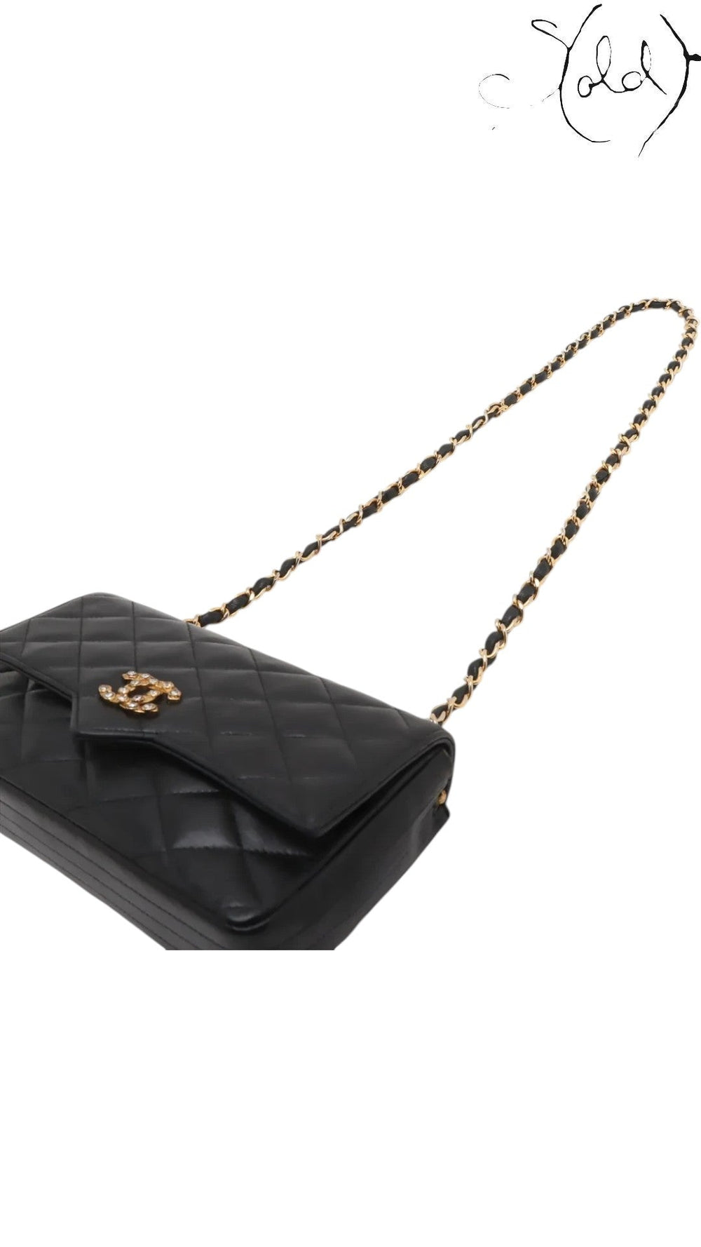 Sold Attire vintage Chanel black quilted lambskin single flap bag featuring a crystal CC turn-lock and gold chain strap.
