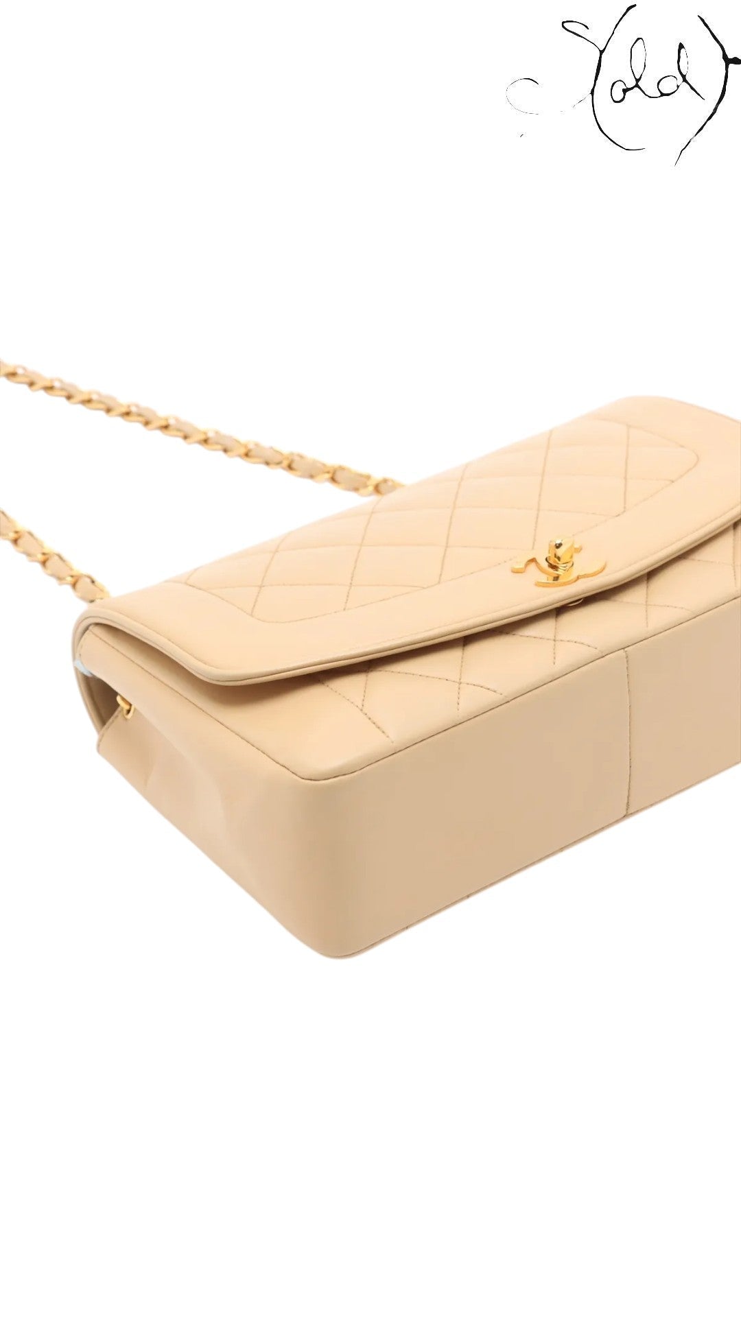 Sold Attire beige lambskin Chanel Diana medium flap bag with gold hardware and chain strap.