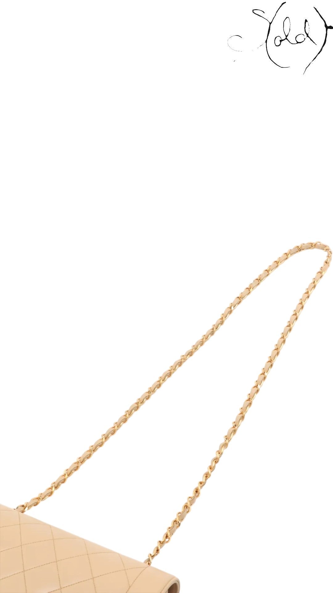 Sold Attire beige lambskin Chanel Diana Medium bag with 24k gold hardware and leather-threaded chain.