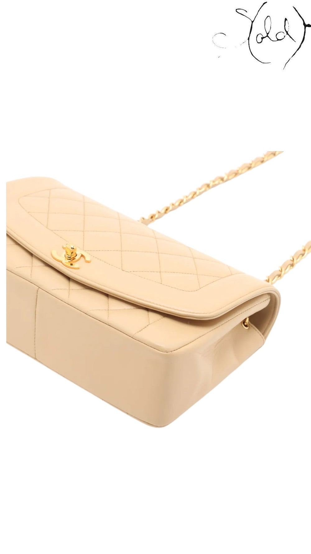Sold Attire beige lambskin Chanel Diana medium bag with gold hardware and quilted stitching.