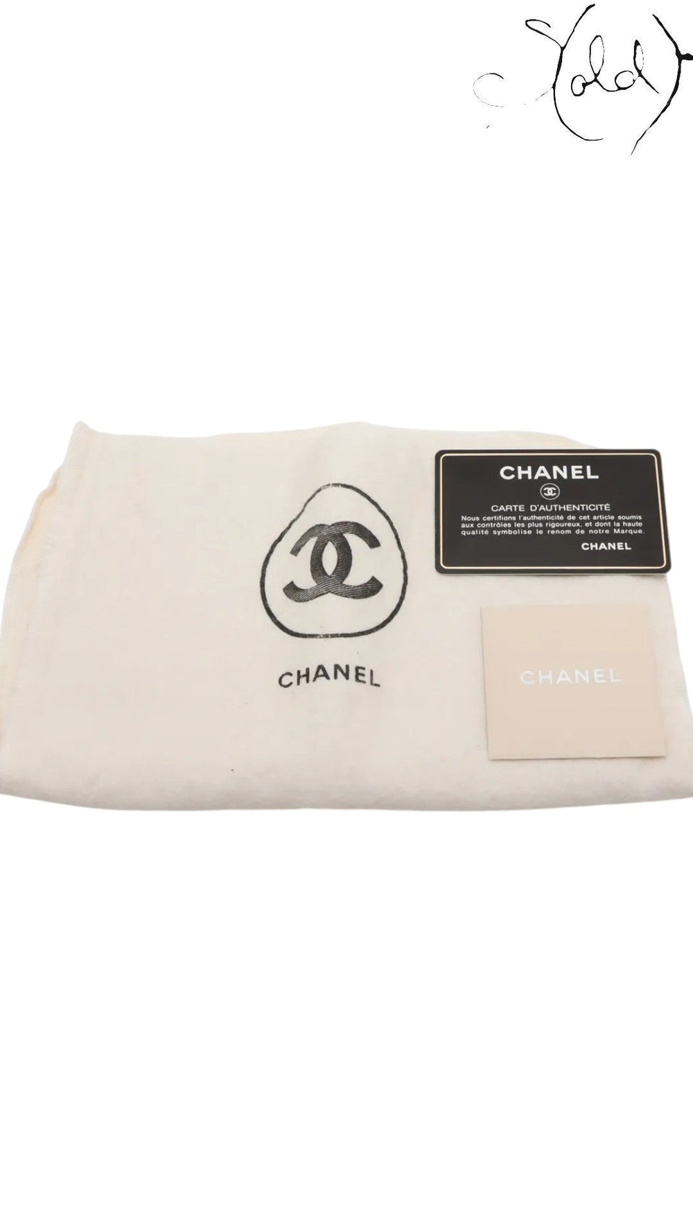 Sold Attire Chanel Medium Classic Double Flap beige lambskin bag with authenticity card and dust bag.