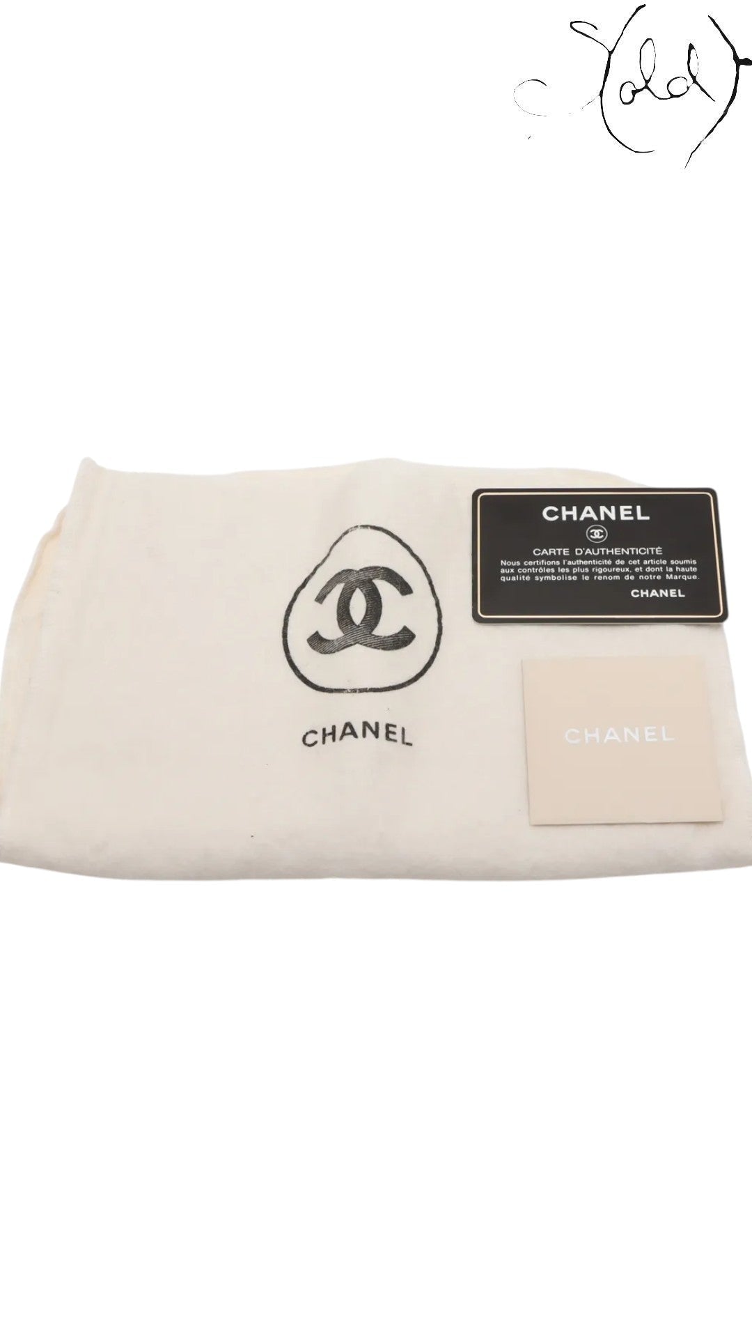 Sold Attire Chanel Medium Classic Double Flap beige lambskin bag with authenticity card and dust bag.