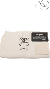 Sold Attire Chanel Medium Classic Double Flap beige lambskin bag with authenticity card and dust bag.