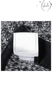 Sold Attire black wool pencil skirt, FR 38, early 2010s. Features a bias cut and CC button detail.