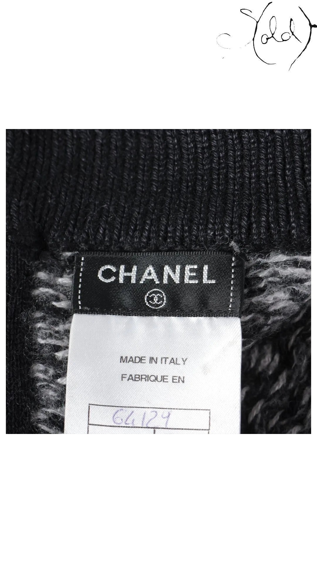 Sold Attire black wool pencil skirt with Chanel logo tag and care label. Early 2010s ready-to-wear.