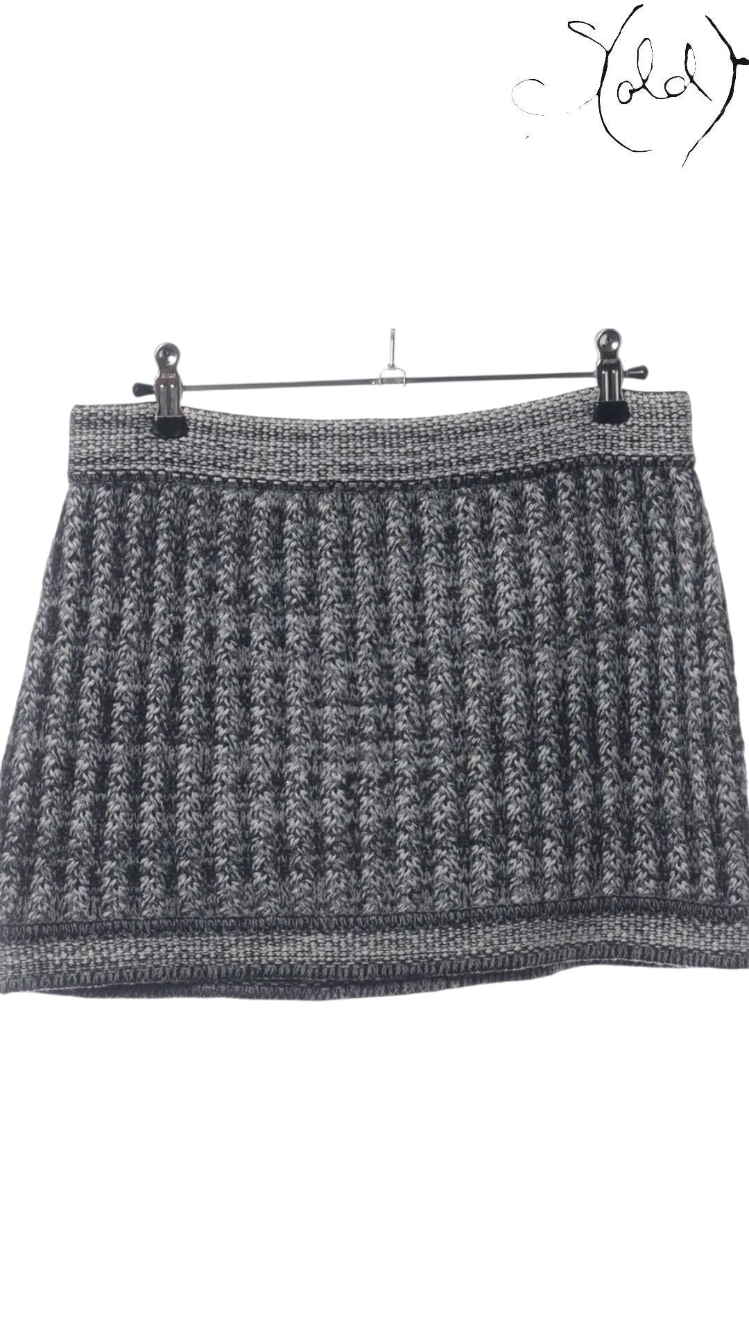 Sold Attire black and grey knit mini skirt with ribbed texture and elasticated waistband.