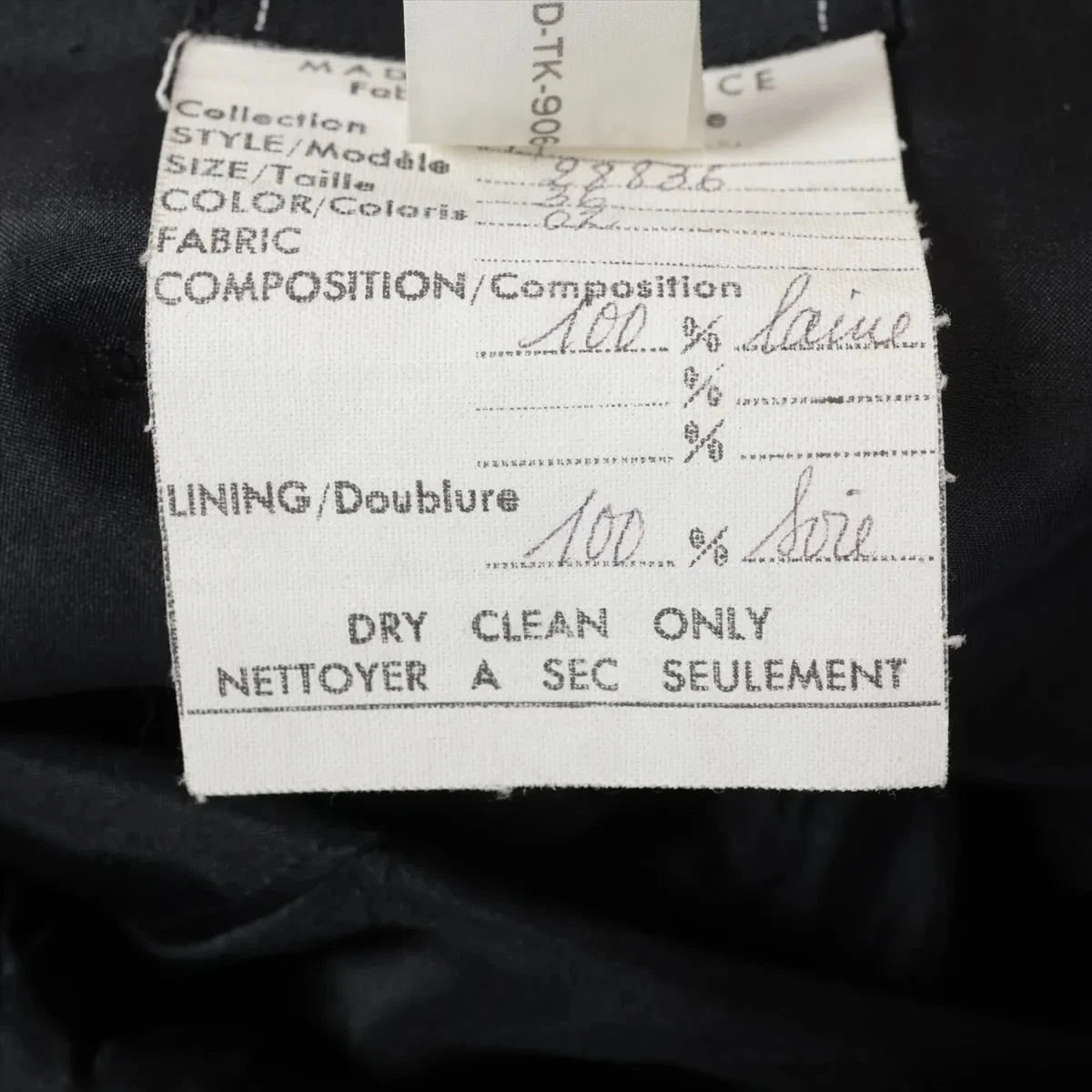 Chanel Boutique Coco Button Wool Skirt - Black Wool Size 36 - Vintage Made in France, Close-up | Sold Attire