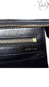 Sold Attire Chloe Alice satchel interior featuring black leather trim, brass-tone zipper, and Made in Italy stamp.