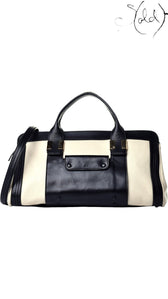 Sold Attire Chloe Alice large satchel in husky white sheepskin and calfskin with black leather trim and brass hardware.