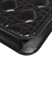 Sold Attire black lambskin Christian Dior Dioraddict flap bag with cannage quilting and aged gold hardware.