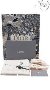 Sold Attire: Dior Lady Dior medium white lambskin bag with rose gold hardware, including box, dust bag, and charms.