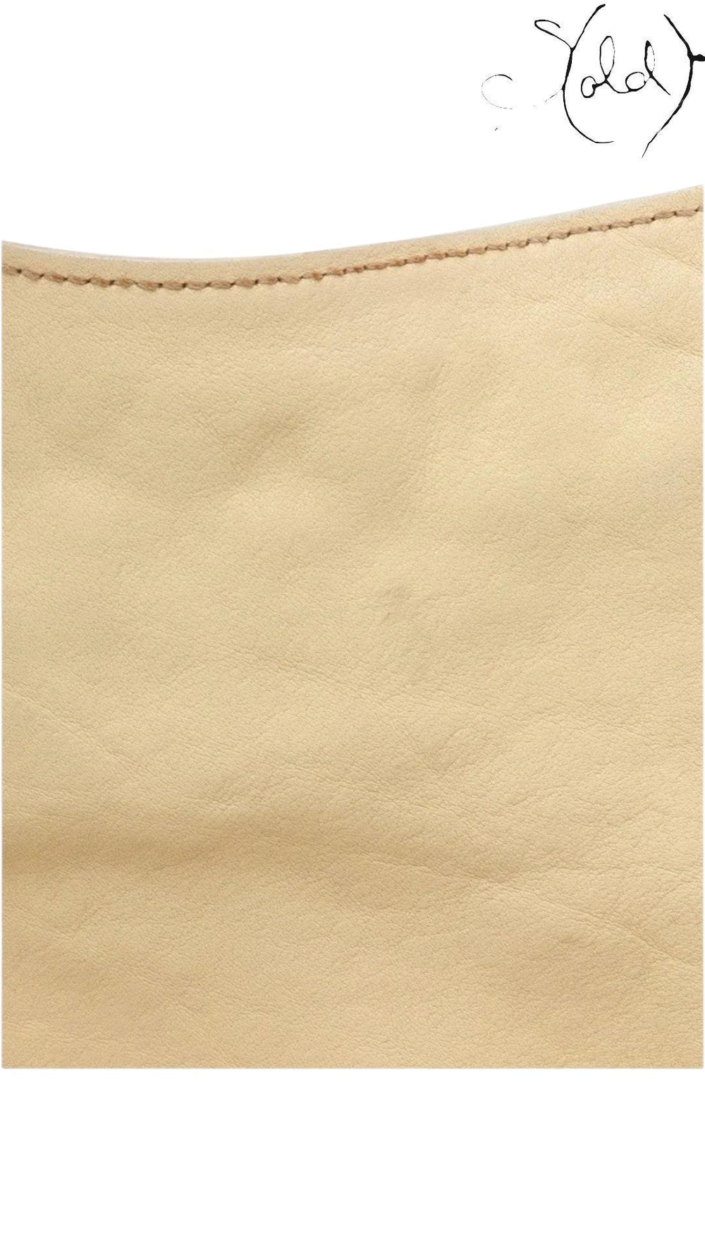 Sold Attire beige calf leather texture detail of a vintage Dior Gaucho shoulder bag showing fine grain and stitching