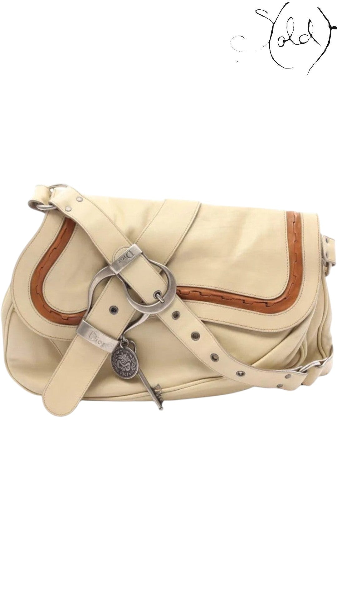 Sold Attire vintage Dior Gaucho shoulder bag in beige calf leather with silver-tone equestrian hardware and charm.