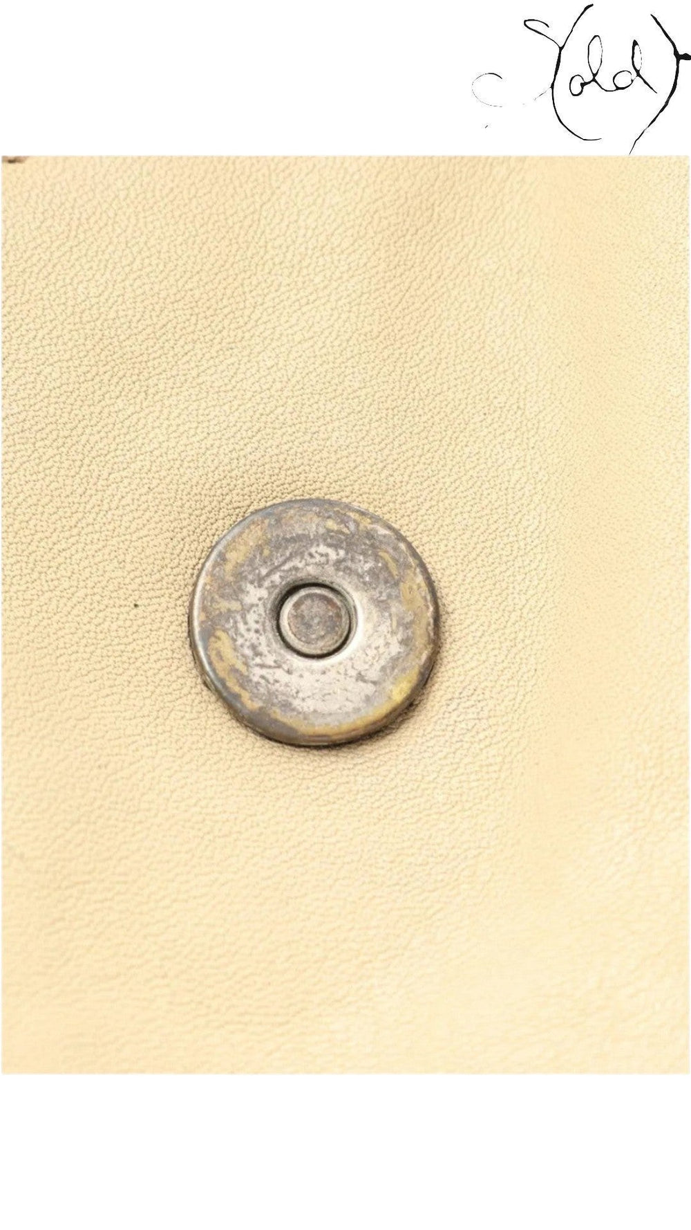 Sold Attire Dior Gaucho shoulder bag magnetic closure detail featuring silver-tone hardware on beige calf leather