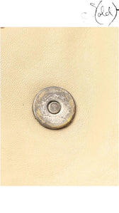 Sold Attire Dior Gaucho shoulder bag magnetic closure detail featuring silver-tone hardware on beige calf leather