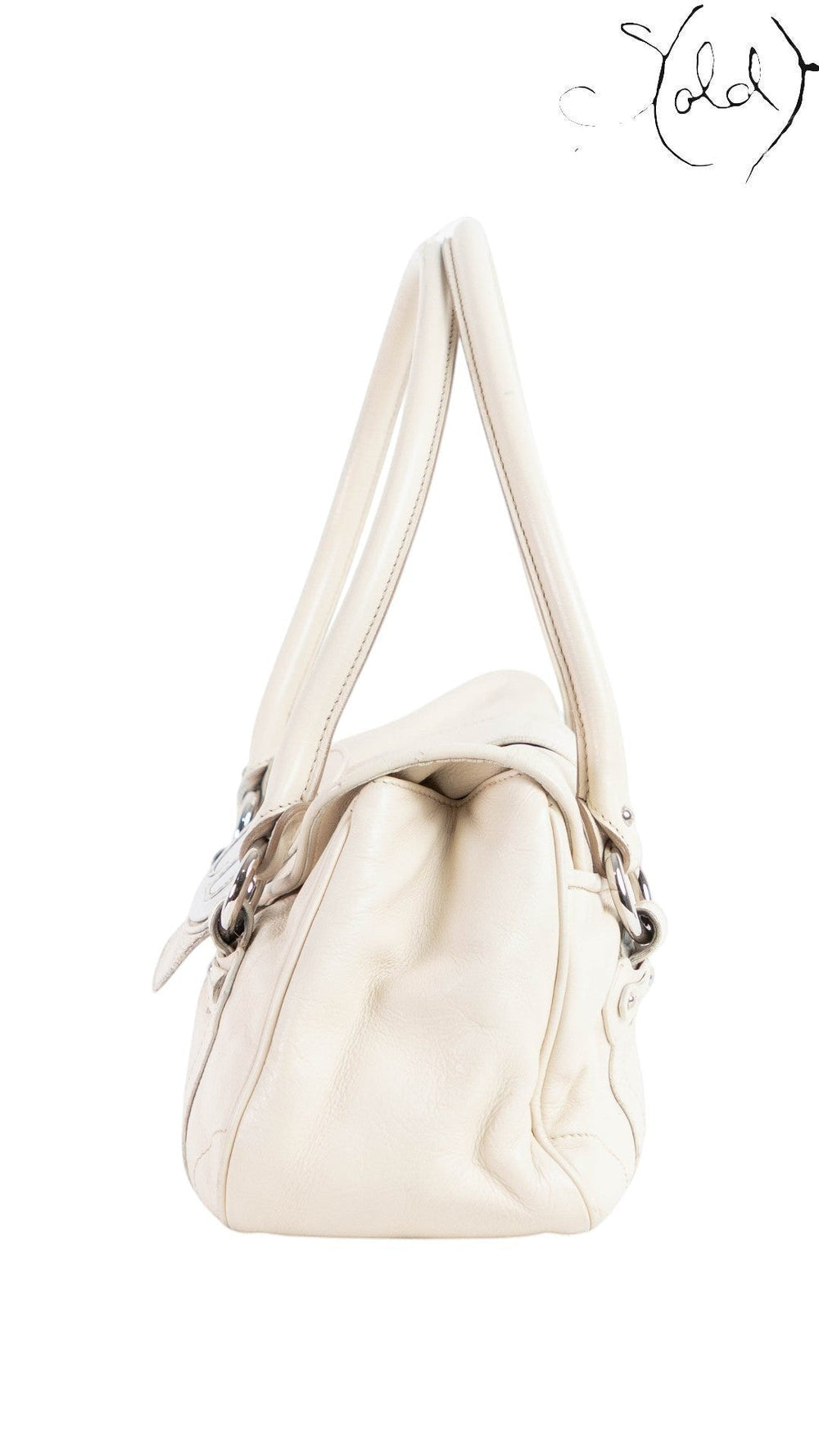 Side view of a cream leather Dior Saint Germaine flap bag with silver-tone hardware from Sold Attire