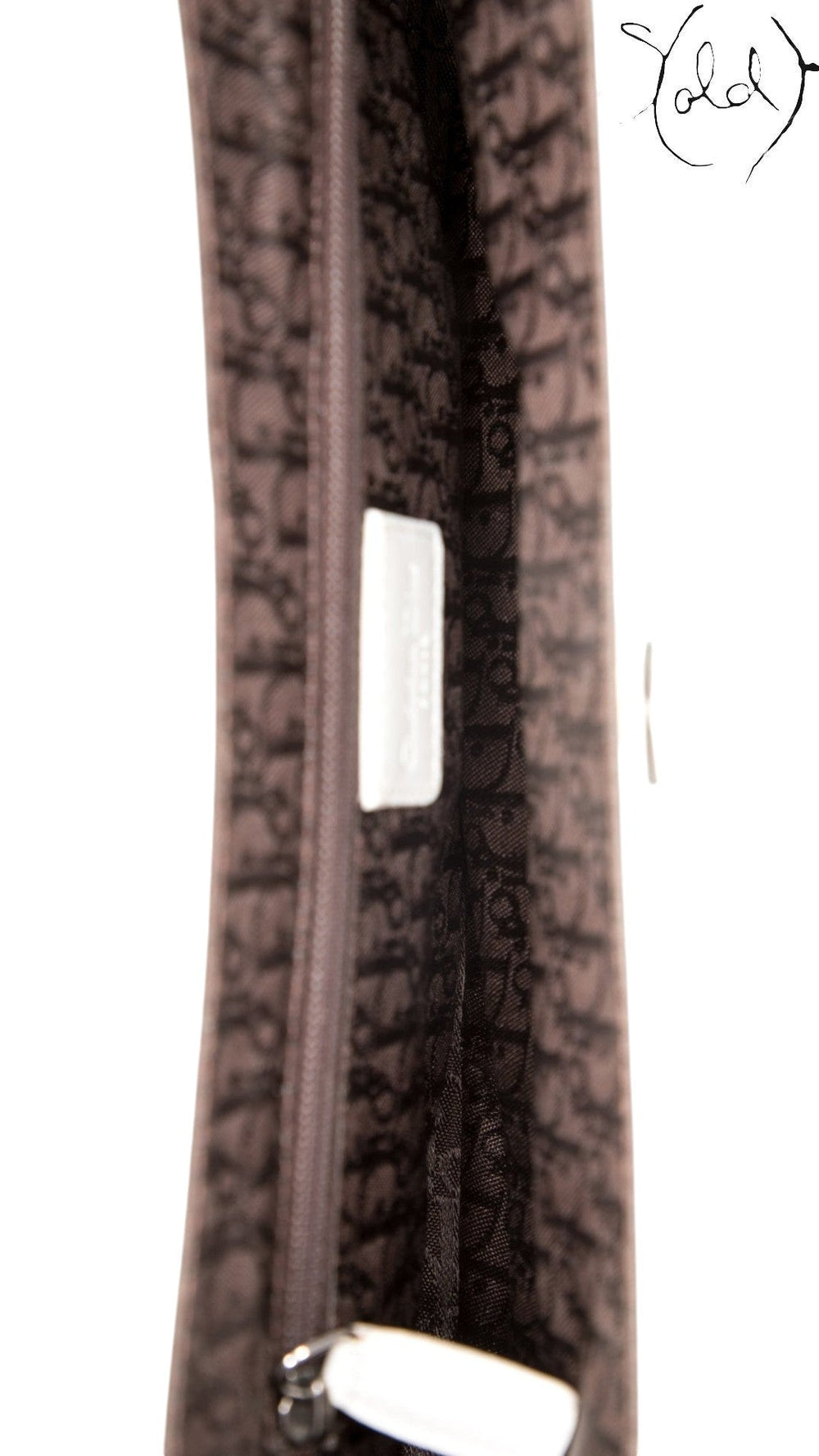 Sold Attire Dior Street Chic vintage shoulder bag interior featuring dark brown logo jacquard lining and brand tag