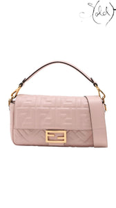 Sold Attire pink embossed calfskin Fendi Mamma Baguette with FF jacquard motif and gold-tone hardware.