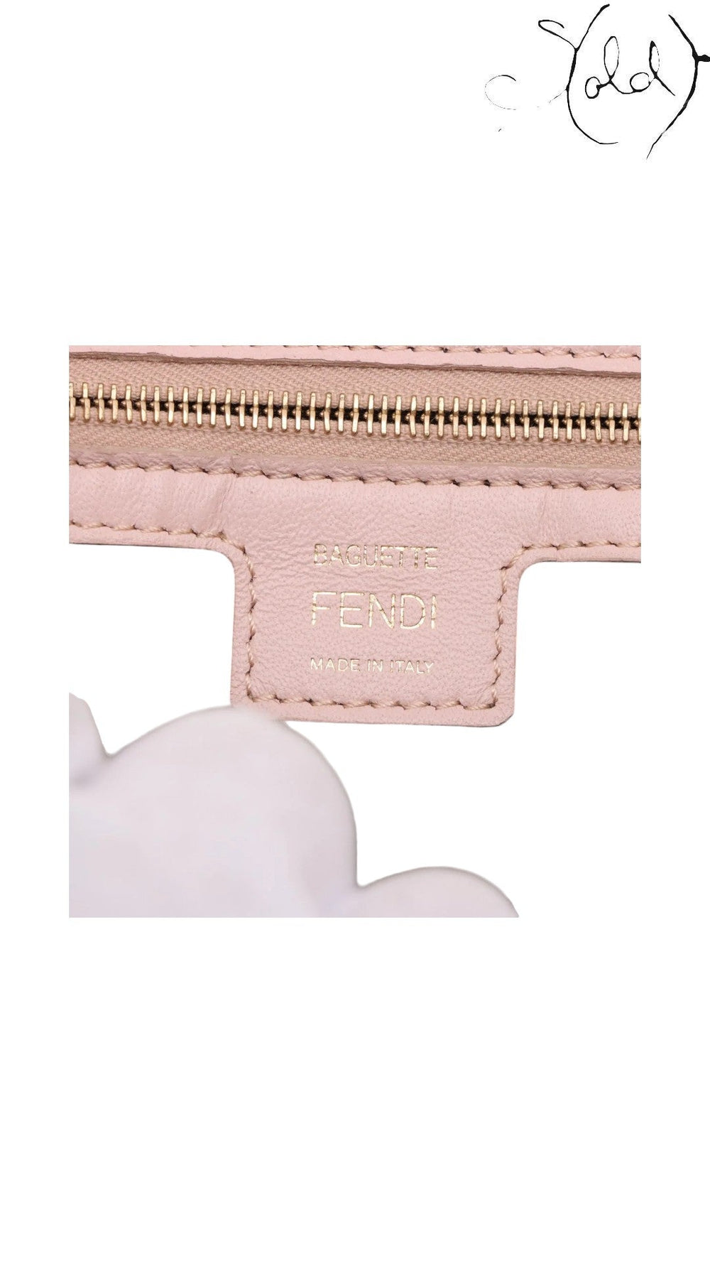 Sold Attire pink embossed calfskin Fendi Mamma Baguette with gold Fendi logo and Made in Italy stamp.
