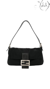 Sold Attire black Fendi Mamma Baguette shoulder bag in jersey with leather trim and silver FF logo clasp.