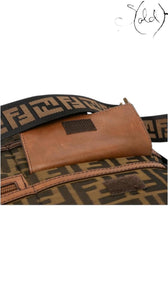 Sold Attire vintage Fendi Zucca messenger bag in tobacco canvas with brown leather trim and FF logo strap detail
