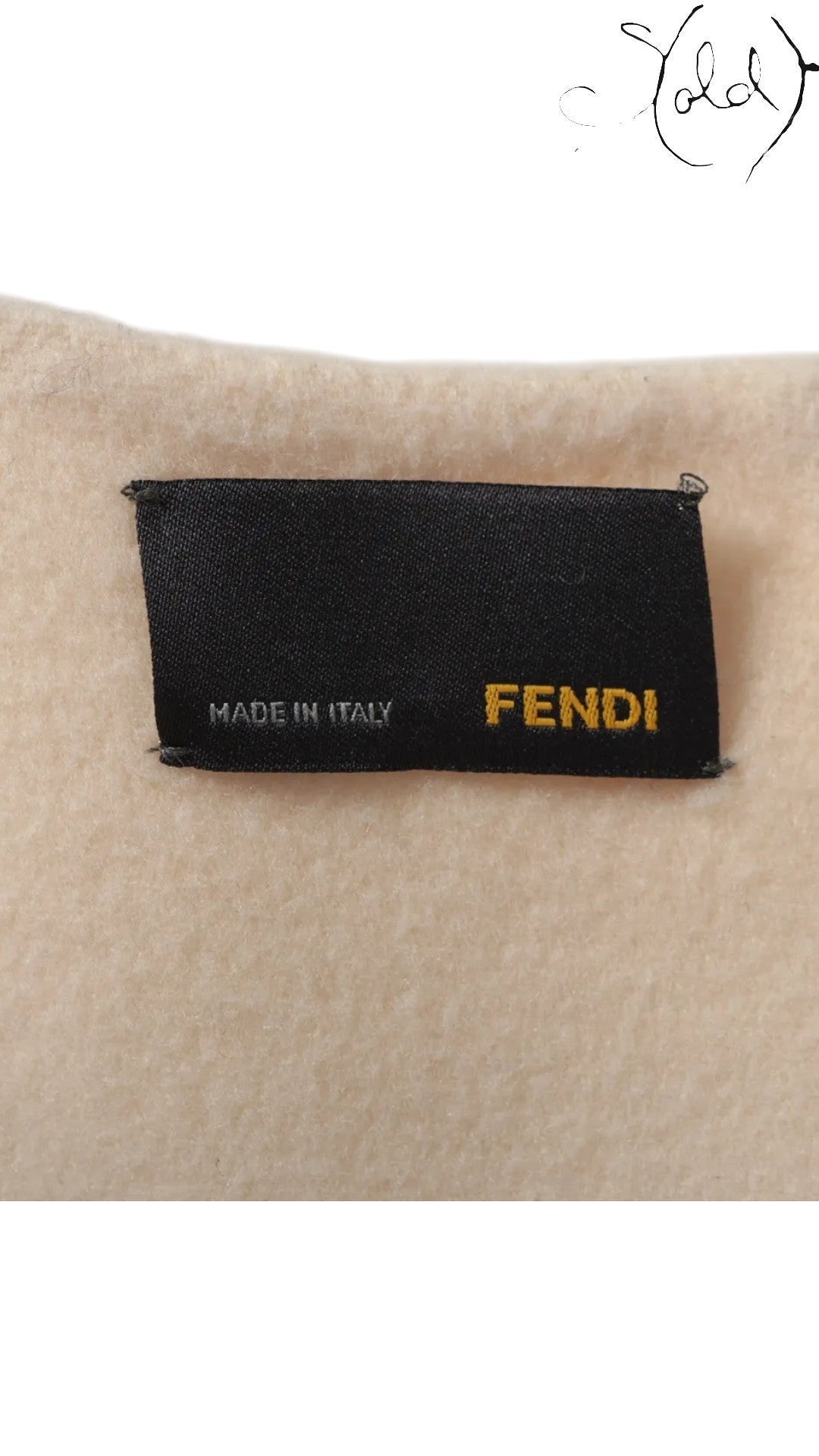 Sold Attire Fendi ivory wool sleeveless dress, size 38, with black label showing 'Made in Italy' and yellow 'FENDI' logo.