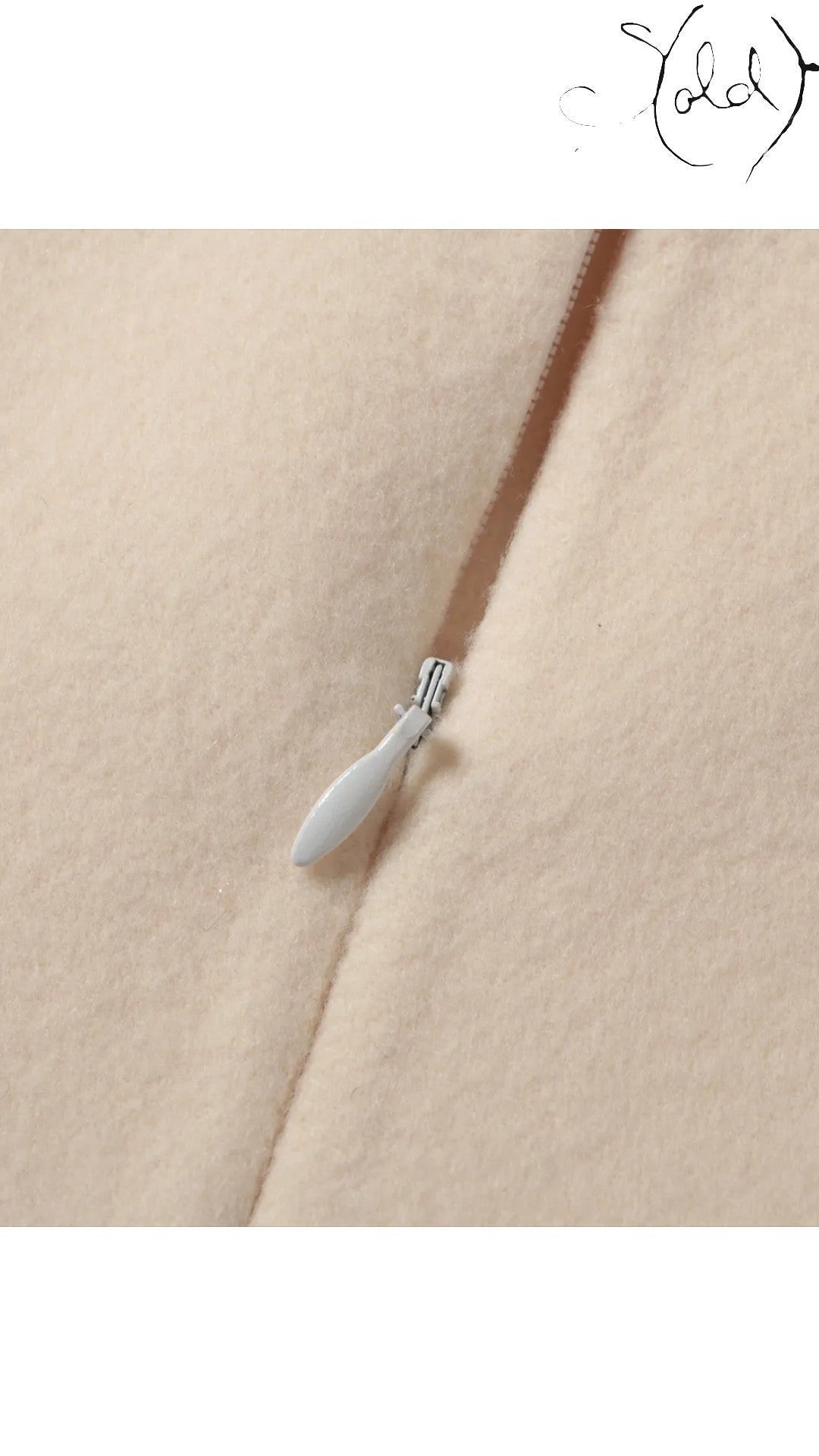 Sold Attire Fendi ivory wool sleeveless dress with a side zipper detail. Size 38.