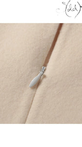 Sold Attire Fendi ivory wool sleeveless dress with a side zipper detail. Size 38.