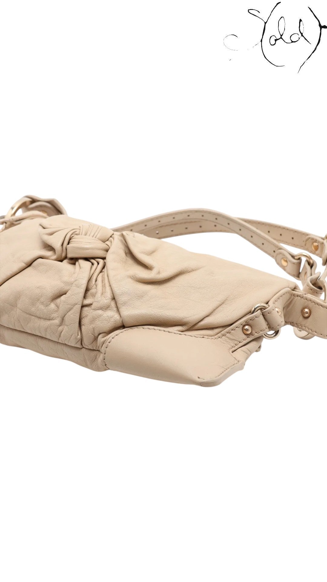 Sold Attire beige leather Fendi Knot shoulder bag with gold-tone hardware and knotted detail.