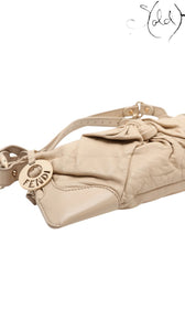 Sold Attire beige leather Fendi Knot shoulder bag with gold-tone Fendi logo charm and knotted detail.