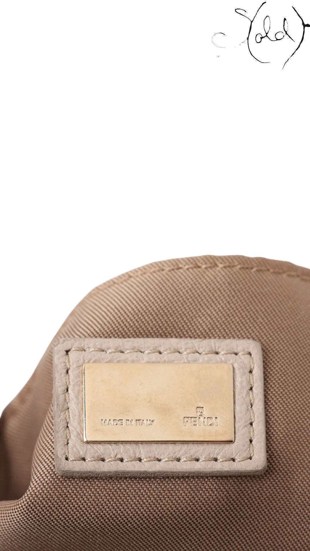 Sold Attire beige leather Fendi Knot shoulder bag interior label with gold-tone hardware and Fendi logo.