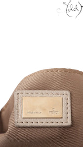 Sold Attire beige leather Fendi Knot shoulder bag interior label with gold-tone hardware and Fendi logo.