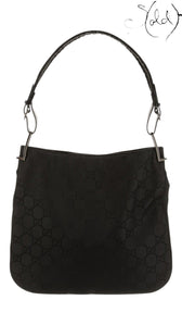 Sold Attire pre-owned Gucci black iridescent GG monogram canvas hobo baguette bag with silver-tone hardware.