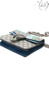 Sold Attire Gucci Dionysus GG Blooms beige and blue floral print canvas shoulder bag with tiger head clasp and silver chain.