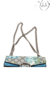 Sold Attire Gucci Dionysus GG Blooms beige and blue floral print shoulder bag with aged silver chain and tiger head clasp.
