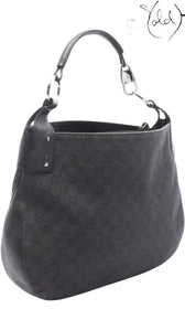 Sold Attire vintage Gucci 00s black GG Supreme canvas shoulder bag with calfskin leather trim and silver hardware