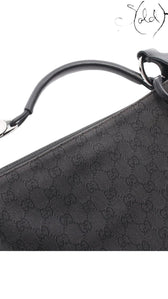 Sold Attire vintage Gucci 00s black GG Supreme canvas shoulder bag with calfskin leather trim and silver hardware