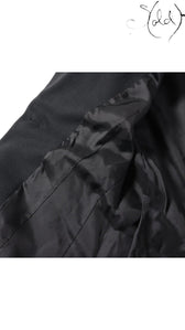 Sold Attire Gucci Tom Ford era black wool blazer, size 40, showing interior lining and buttonhole detail.