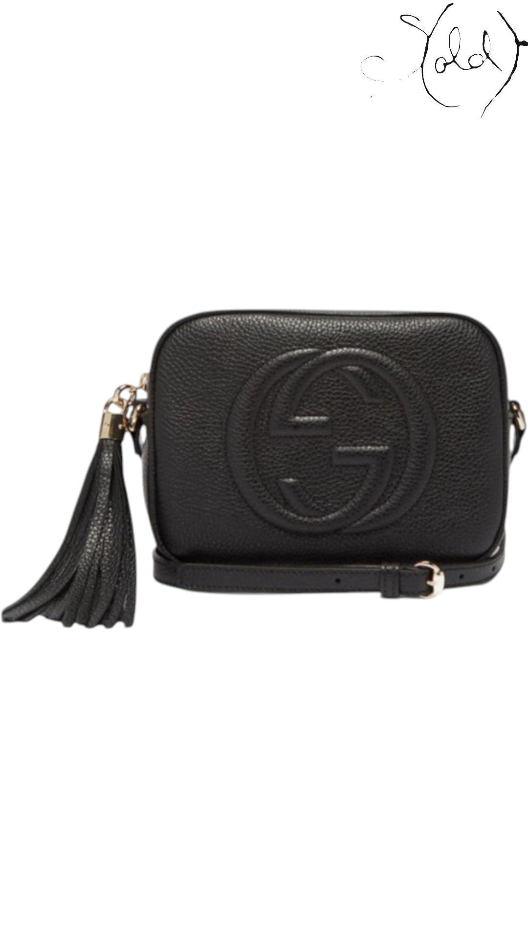 Sold Attire black pebbled calfskin Gucci Soho Disco crossbody bag with tassel and embossed GG logo.