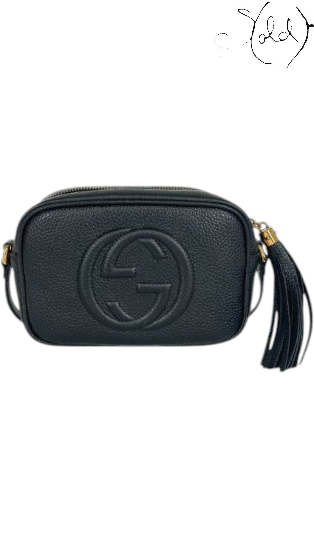 Sold Attire black pebbled calfskin Gucci Soho Disco crossbody bag with embossed GG logo and tassel detail.
