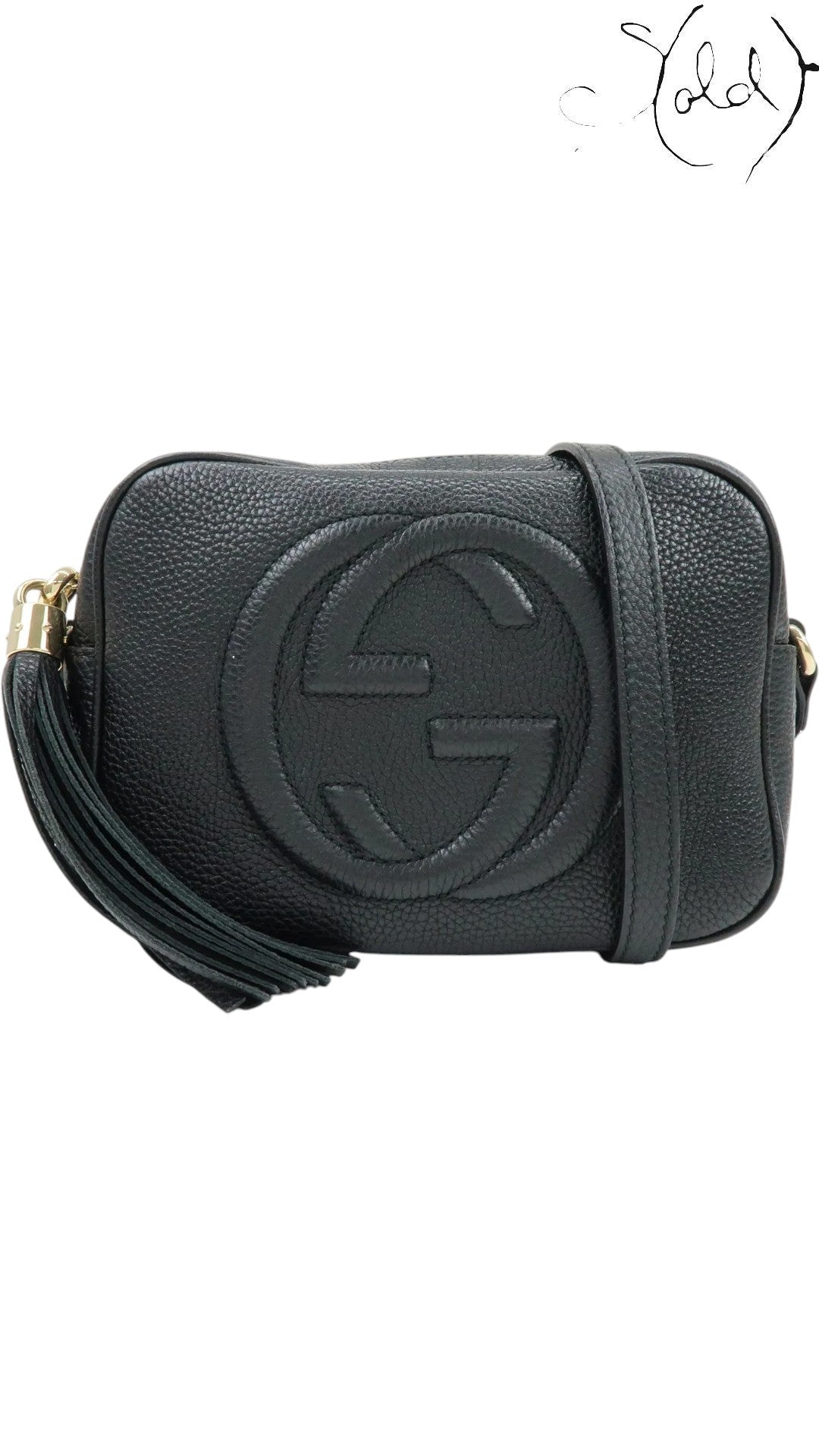 Sold Attire black pebbled calfskin Gucci Soho Disco crossbody bag with embossed GG logo and tassel.