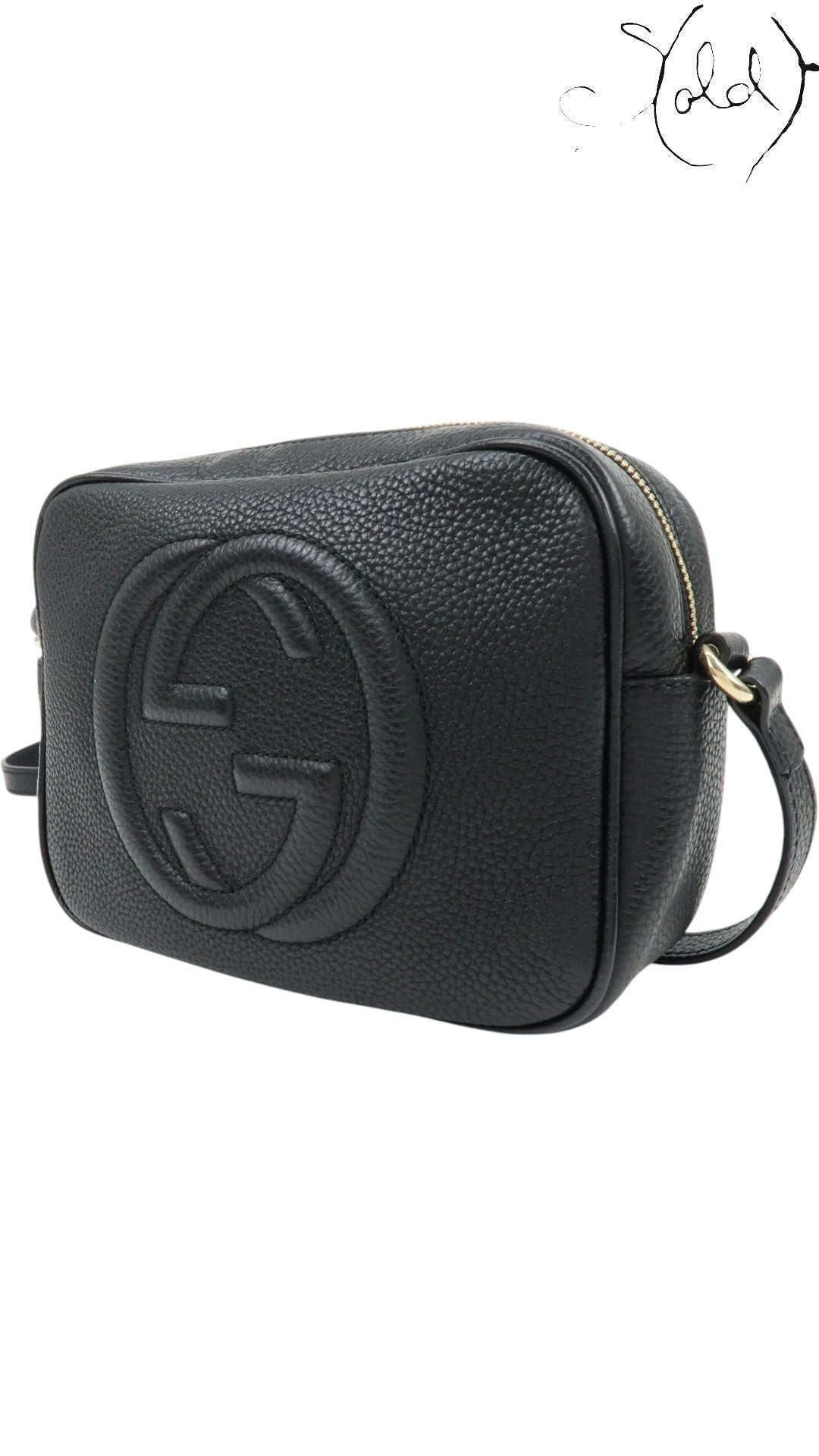 Sold Attire black pebbled calfskin Gucci Soho Disco crossbody bag with embossed GG logo and tassel detail.