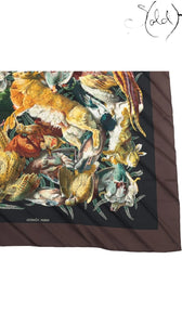 Sold Attire pre-owned Hermes Carre 90 Gibiers silk scarf featuring a detailed hunting print on black and brown silk.