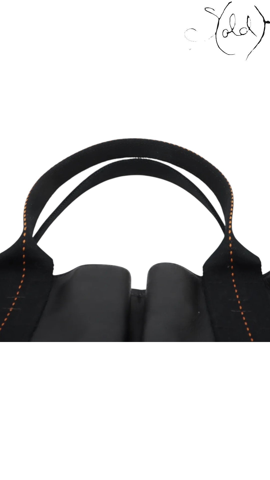 Sold Attire black Veau Derma calfskin Hermès Caravan Horizontal MM tote bag with orange contrast stitching and silver hardware.