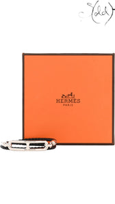 Sold Attire black Swift calfskin Hermès Roulis Double Tour bracelet with palladium hardware and iconic H clasp, presented with its orange box.