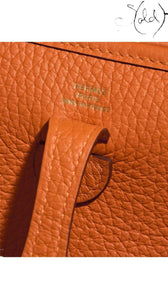 HERMÈS Évelyne TPM 16 – Orange Clemence, Hardware detail | Sold Attire